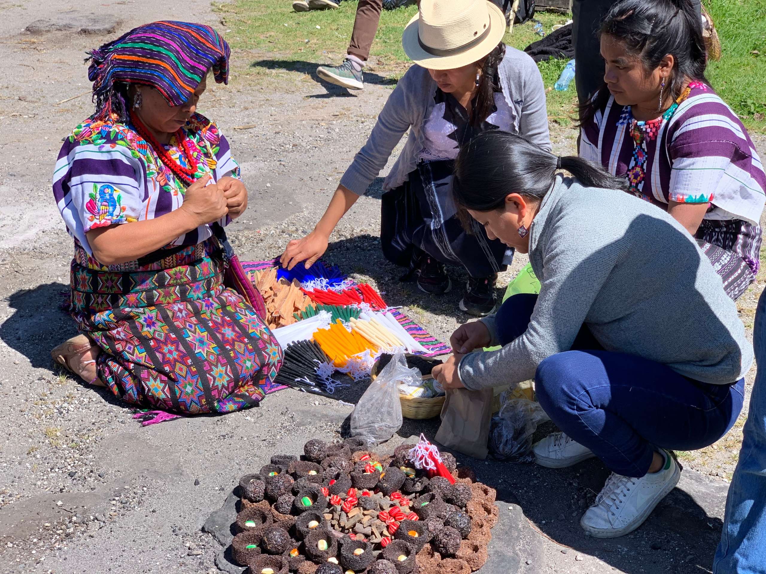  - Preparing the ceremonial offering at the Chikabal Lagoon, Guatemala. (Photo Credit: Nicola Wagenberg, The Cultural Conservancy)