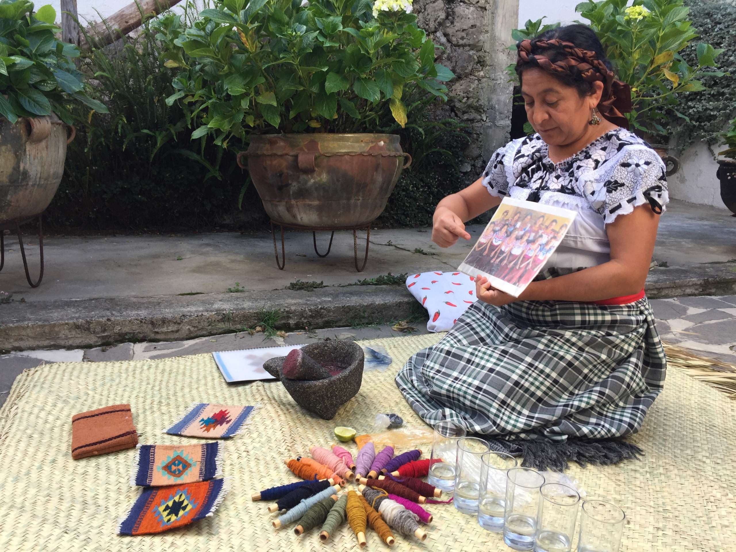  - Zapotec elder demonstrates the production and use of natural pigments by her cooperative of indigenous women in Oaxaca. (Photo Credit: Sandy Hernández Aquino, Yakanal)
